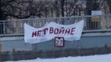 RUSSIA - Action against the war, Gortkinsky bridge, St. Petersburg. Banner "No to war".