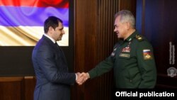 Russia - Russian Defense Minister Sergei Shoigu (right) meets with his Armenian counterpart Suren Papikian in Moscow, February 25, 2022.