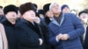 Болат Назарбаев (второй слева) и в то время аким Алматинской области Аманды Баталов (по его левое плечо) на открытии памятника тогда президенту Нурсултану Назарбаеву. Талдыкорган, 30 октября 2016 года