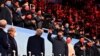 Chinese leader Xi Jinping (center) greets the crowd during the opening ceremony of the Beijing Winter Olympics on February 4. 