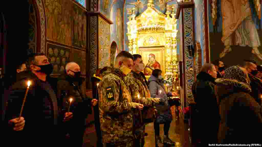 Soldiers take part in the memorial in Kyiv on January 21. The service is an annual event in Ukraine and honors the Ukrainian servicemen who died defending the newly constructed Donetsk airport from Russia-backed separatists in 2014-2015.&nbsp;&nbsp;