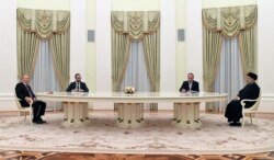 Владимир Путин принимает в Кремле президента Ирана Ибрахима Раиси. 19 января 2022 года