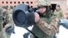 A Ukrainian serviceman points an anti-tank weapon, supplied by Britain, amid tensions between Russia and the West over Ukraine, during drills in the Lviv region in a photo released on January 27.
