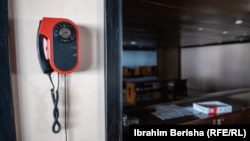 .A telephone in the empty reception area of ​​Hotel Molika