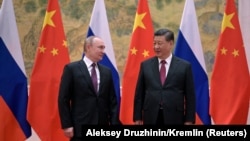 Ресей президенті Владимир Путин (сол жақта) мен Қытай басшысы Си Цзиньпин. Пекин, 4 ақпан 2022 жыл.