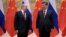 Russian President Vladimir Putin (left) attends a meeting with Chinese President Xi Jinping in Beijing on February 4.