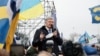 UKRAINE -- The fifth President of Ukraine Petro Poroshenko speaks at a rally of his supporters who arrived at Kyiv Airport to meet him. Kyiv, January 17, 2022