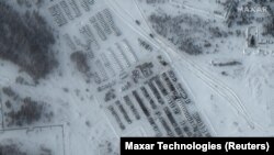 A satellite image shows Russian tanks and artillery support equipment parked in Yelnya, Russia January 19, 2022