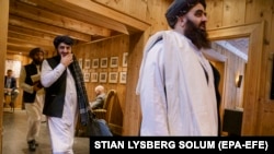 Taliban representatives Abdul Hakim Sharaie, Abdul Bari Omar, and Amir Khan Muttaqi before their meeting with Norwegian officials at the Soria Moria Hotel in Oslo on January 25.