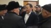 Jenish Moldokmatov (center) is released in the courtroom in Bishkek on February 2.