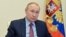 Владимир Путин во время видеоконференции 26 января 2022 года. Фото: ТАСС
