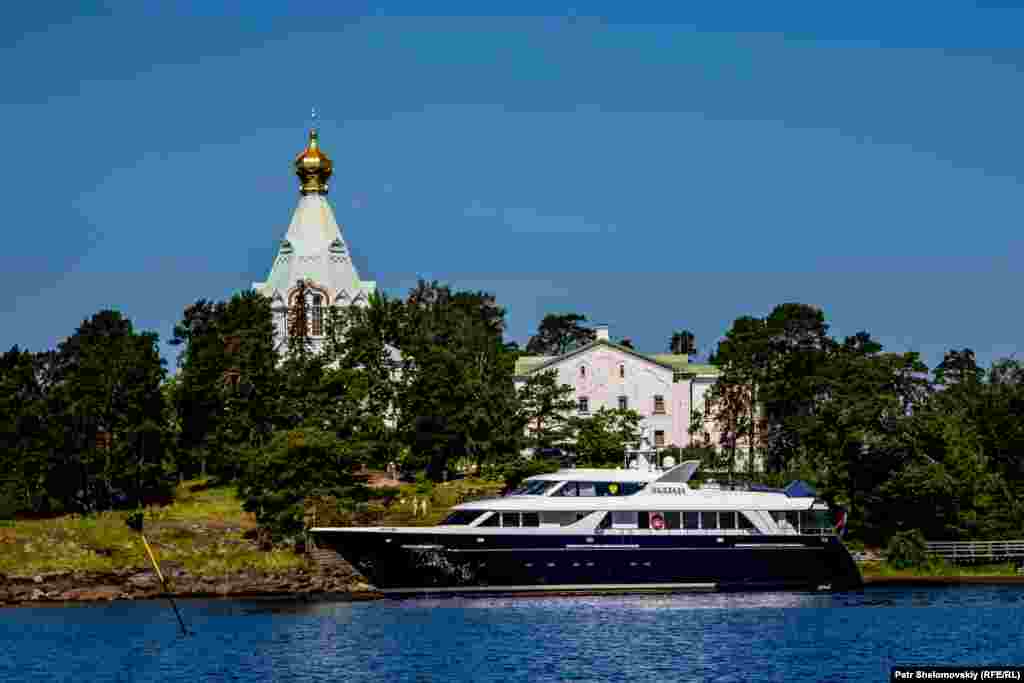 A private yacht belonging to Patriach Kirill, the head of the Russian Orthodox Church, is moored near the monastery.