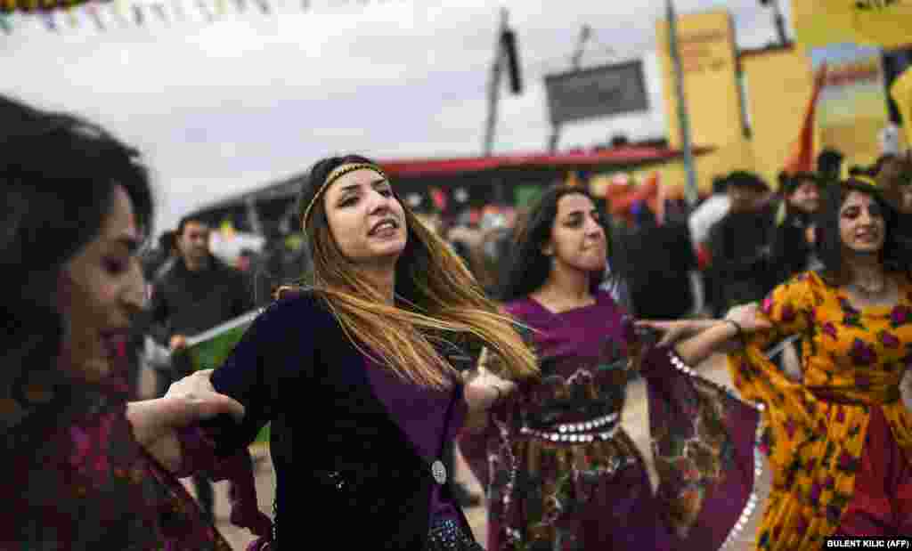 Kurdish women dance during Norouz celebrations in Diyarbakir, southeastern Turkey, on March 21.