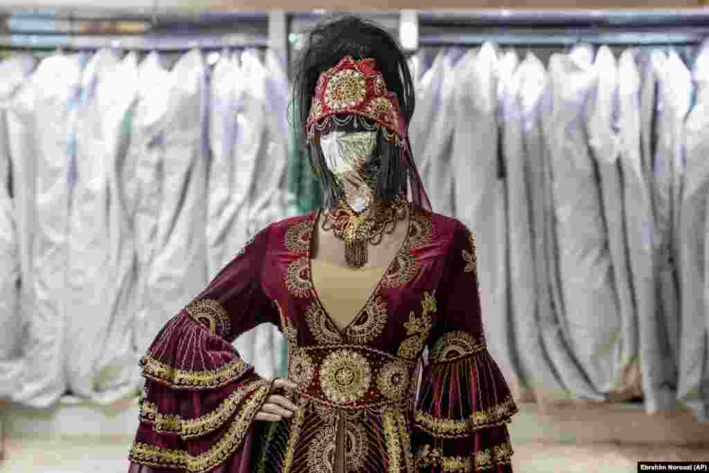 Elaborate wedding dresses have always been popular in Afghanistan. Under the Taliban, weddings are one of the few remaining opportunities for dressing up. But with incomes strained, outfits have become less elaborate.