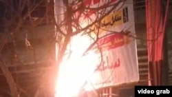 Videos and images on social media have shown protesters setting fire to government banners marking the anniversary.