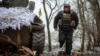 A Ukrainian soldier walks near front line in the Donetsk region on February 1.