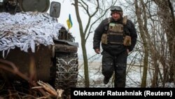 A Ukrainian soldier walks near front line in the Donetsk region on February 1.