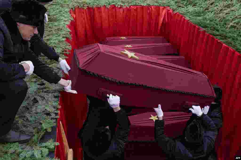 The remains of Soviet soldiers killed in the Battle of Stalingrad during World War II are reburied at a memorial ground in the village of Rossoshka, outside Volgograd, on February 1.&nbsp;