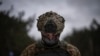 A Ukrainian soldier monitors a drone during a demonstration close to the border with Belarus on February 1.&nbsp;The reconnaissance drones are flown several times a day to detect signs of trouble from the other side.