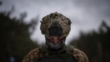 A Ukrainian soldier monitors a drone during a demonstration close to the border with Belarus on February 1.&nbsp;The reconnaissance drones are flown several times a day to detect signs of trouble from the other side.