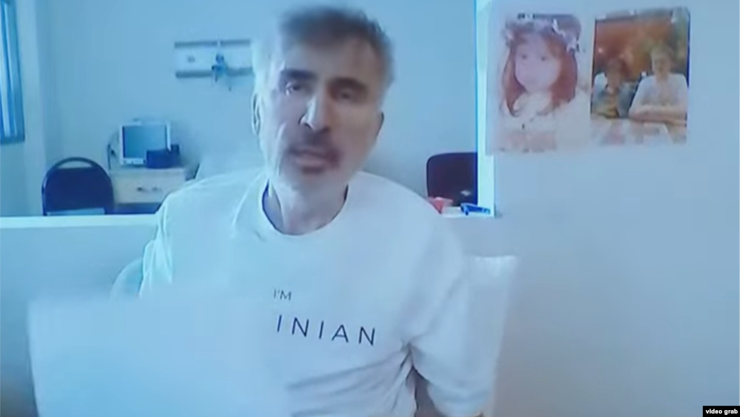 Former Georgian President Mikheil Saakashvili is seen on video at his trial.