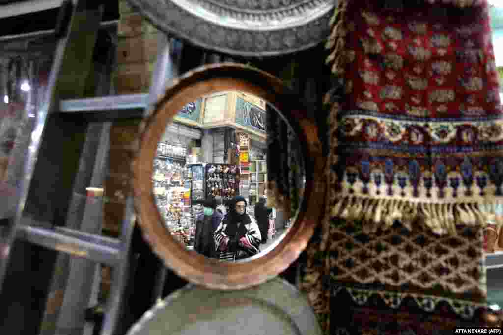 Iranians shop at a bazaar in Tehran&#39;s Tajrish neighborhood.&nbsp;
