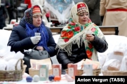 Women attend a festival in Belgorod on January 14.