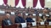 Armenia - Aghasi Matevosian (left) attends a session of Gyumri's municipal council.