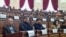 Armenia - Aghasi Matevosian (left) attends a session of Gyumri's municipal council.