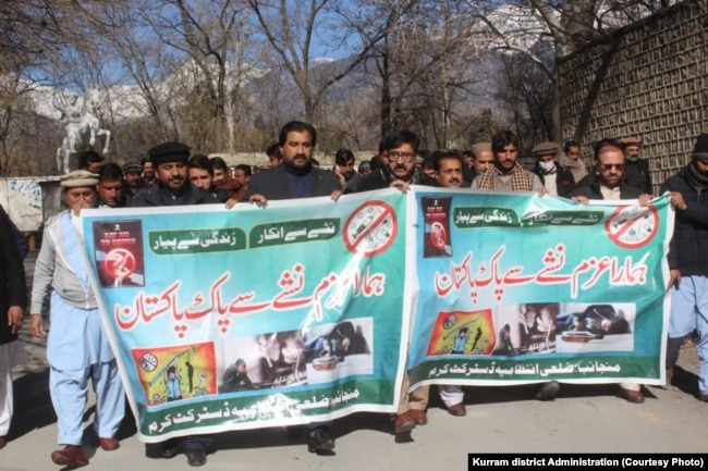 People march in an antidrug campaign in the Kurram district of Khyber Pakhtunkhwa in January.