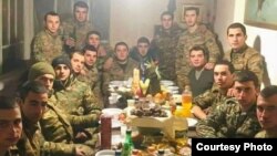 Armenia - Soldiers of an engineer-sapper company stationed in Gegharkunik province have a New Year's Eve dinner party.