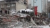 TURKEY - Rescuers carry out a person from a collapsed building after an earthquake in Malatya, February 6, 2023. 