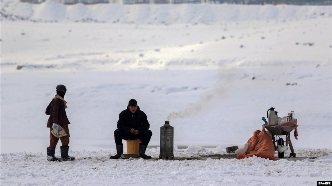 A tea-seller braves the cold amid freezing temperatures in Kabul. 