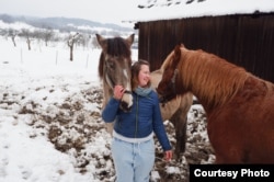 Bachurynskaya​ with horses in Poland.