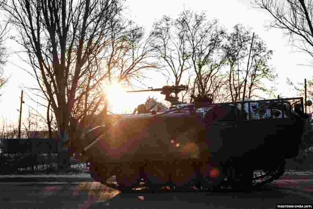 A Ukrainian armored personnel carrier in the battered town