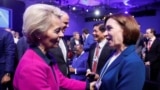 European Commission President Ursula von der Leyen (left) speaks wth MOldovan President Maia Sandu and the World Economic Forum in Davos, Switzerland. (file photo)