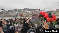 Videos published on social networks showed a large gathering at the grave of Abdullahi with people chanting "The martyr never dies!" and "Death to the dictator!," a reference to Iranian Supreme Leader Ayatollah Ali Khamenei, on January 17.