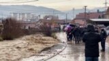 People around the stormy river in Novi Pazar in Serbia