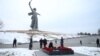 Russian President Vladimir Putin (center) visits the Mamayev Kurgan World War II Memorial complex in Volgograd on February 2.