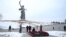 Russian President Vladimir Putin (center) visits the Mamayev Kurgan World War II Memorial complex in Volgograd on February 2.