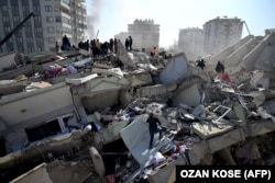 Rescue workers search for survivors among the rubble of collapsed buildings in Kahramanmaras, Turkey, on February 9.