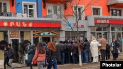 Nagorno-Karabakh - Residents of Stepanakert line up outside a local food store, January 20, 2023.