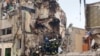 Рятувальники уже третю добу розбирають завали зруйнованого російським ракетним ударом житлового будинку Дніпра. 16 січня 2023 року