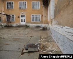 Painted outlines show where Nicolae and Elena Ceausescu fell after being executed.