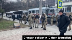 The activists were detained when they gathered near the Kyiv district court building in Simferopol on January 25.