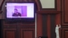 Арыктап кеткен Михаил Саакашвили. Сот залындагы монитордон тартылган сүрөт. 
