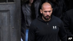 Andrew Tate leaves after appearing at the Court of Appeal in Bucharest on January 10.