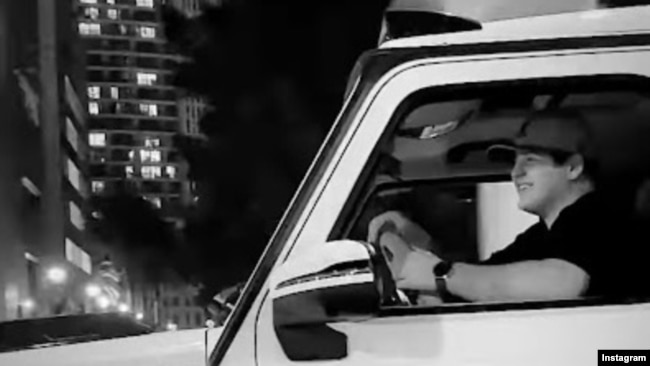 Fifteen-year-old Adam Kadyrov behind the wheel in Dubai.
