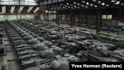 Dozens of German-made Leopard 1 tanks are seen in a hangar in Tournais, Belgium.