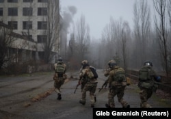 Спільні навчання Збройних сил України, Національної гвардії, Прикордонної служби та СБУ на кордоні з Білоруссю неподалік Чорнобильської атомної електростанції, у покинутому місті Прип'ять, Україна, 20 січня 2023 року